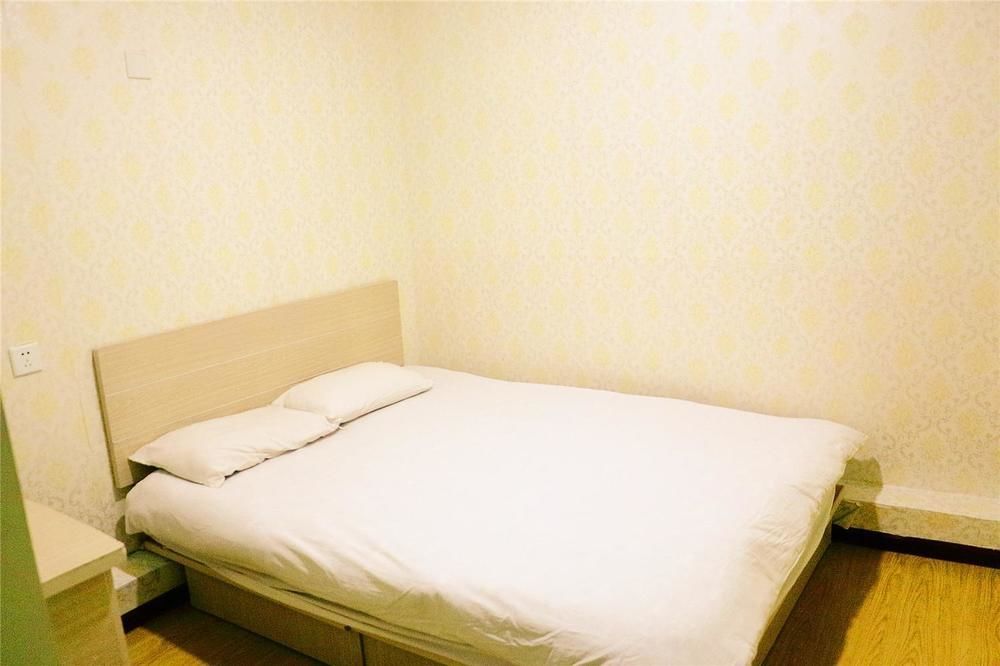 Qingdao Peninsula Four Seasons Business Hotel エクステリア 写真