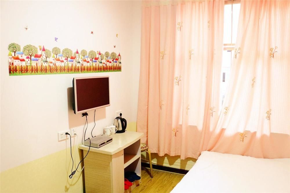 Qingdao Peninsula Four Seasons Business Hotel エクステリア 写真