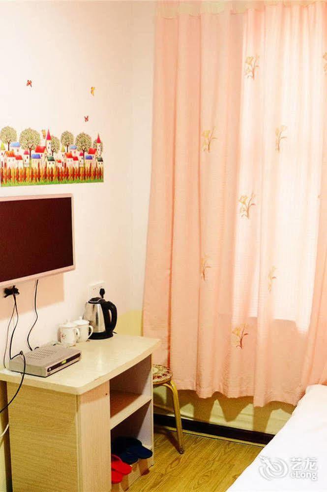 Qingdao Peninsula Four Seasons Business Hotel エクステリア 写真
