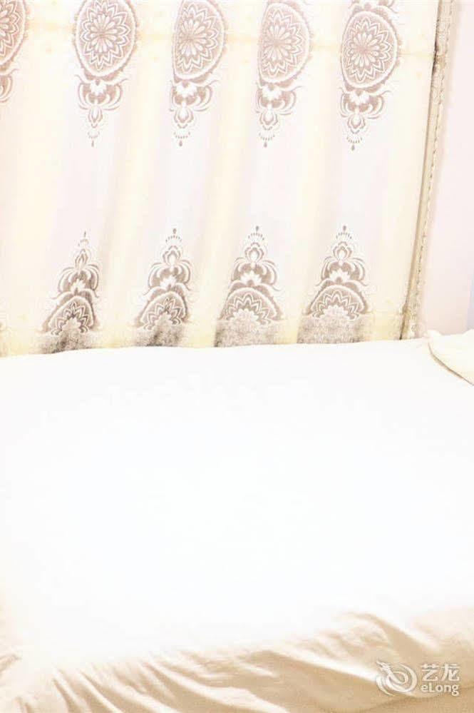 Qingdao Peninsula Four Seasons Business Hotel エクステリア 写真